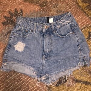 Light wash distressed jean shorts